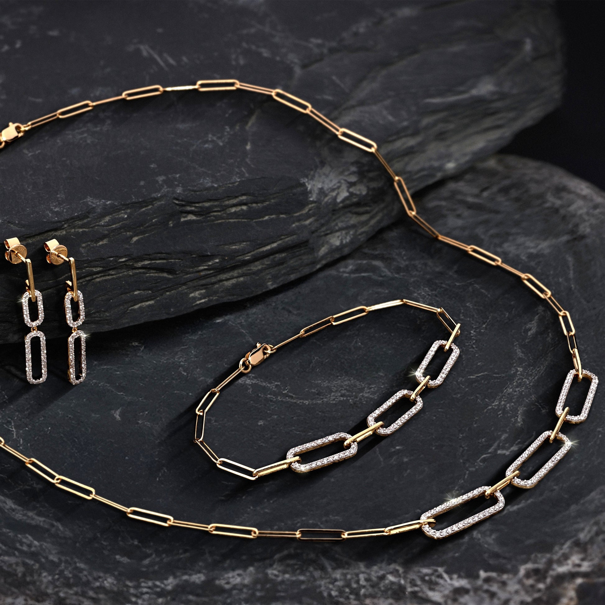 Luxury 0.53ct diamond bracelet crafted in 18KT yellow gold on grey stone.