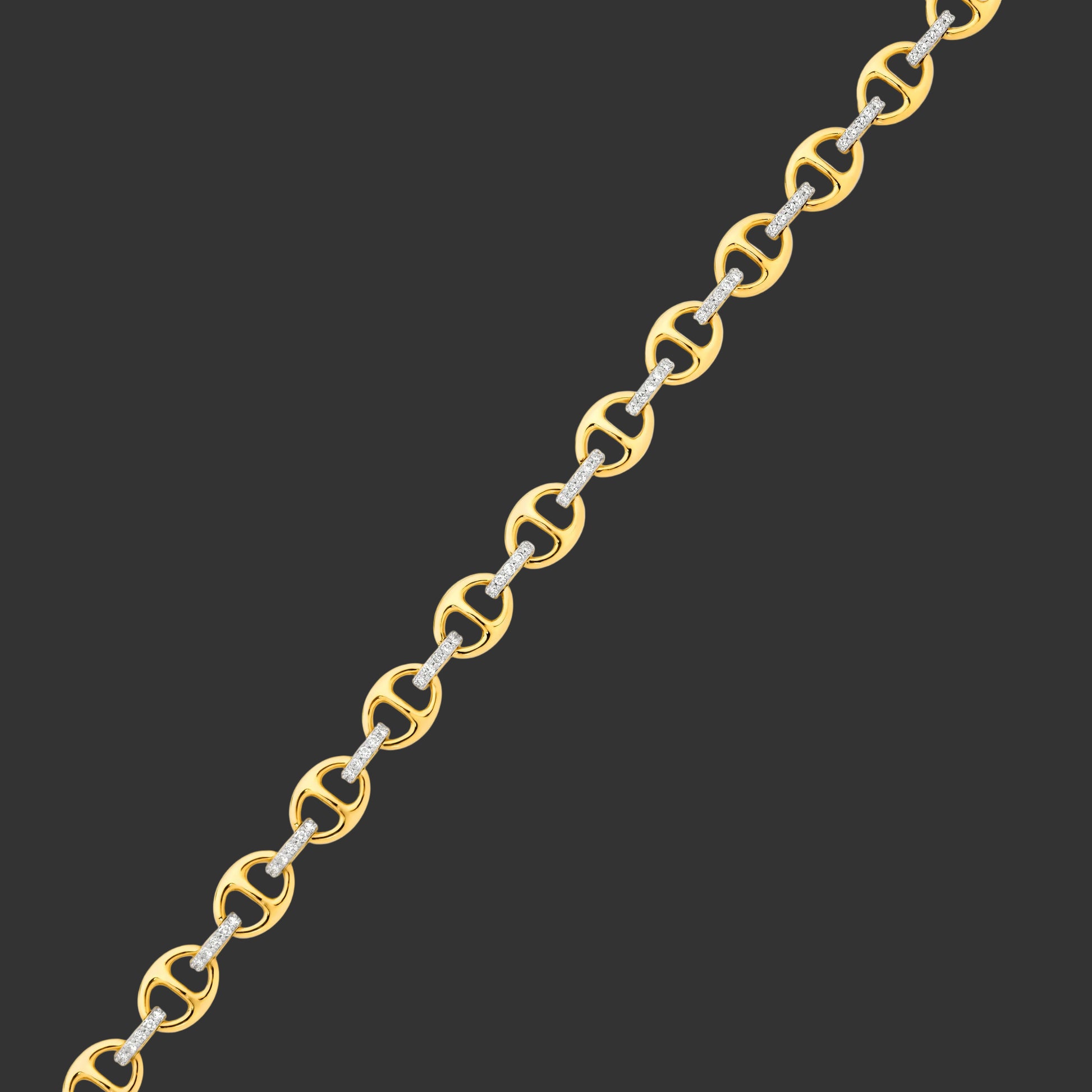 Gold and silver chain bracelet on a white background